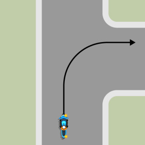 A blue motorcycle travelling on an unlaned road, indicating and turning right.