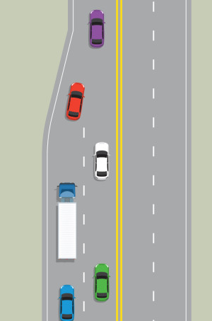 Two lanes are merging into one lane. As the vehicles merge each takes a turn entering the single lane.