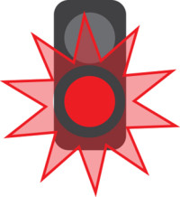 Flashing red lights in a traffic light style light.