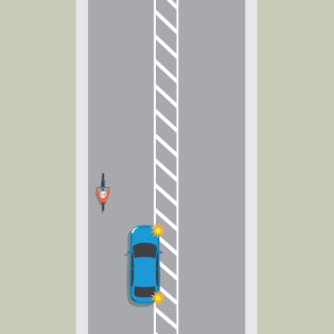 A blue car indicates right and moves onto the flush median to pass a cyclist.