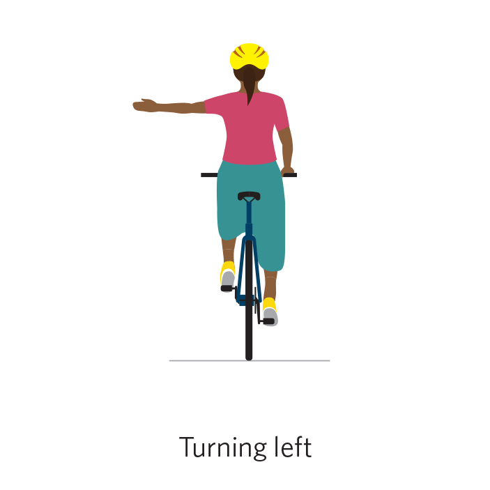 A person on a bicycle holds their left arm out to signal left.