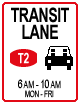 Regulatory traffic sign with four lines of text and it has a red border around the sign. The top line says transit lane. The middle line has a T2 icon and a car icon next to each other. The third line in smaller print says 6am-10am. The fourth line also has Mon-Fri in smaller print. 